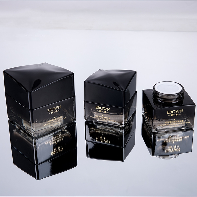 Уникальная квадратная стеклянная кремовая банка с поднятой крышкой для косметической упаковки Уникальная квадратная стеклянная кремовая банка с поднятой крышкой для косметической упаковки